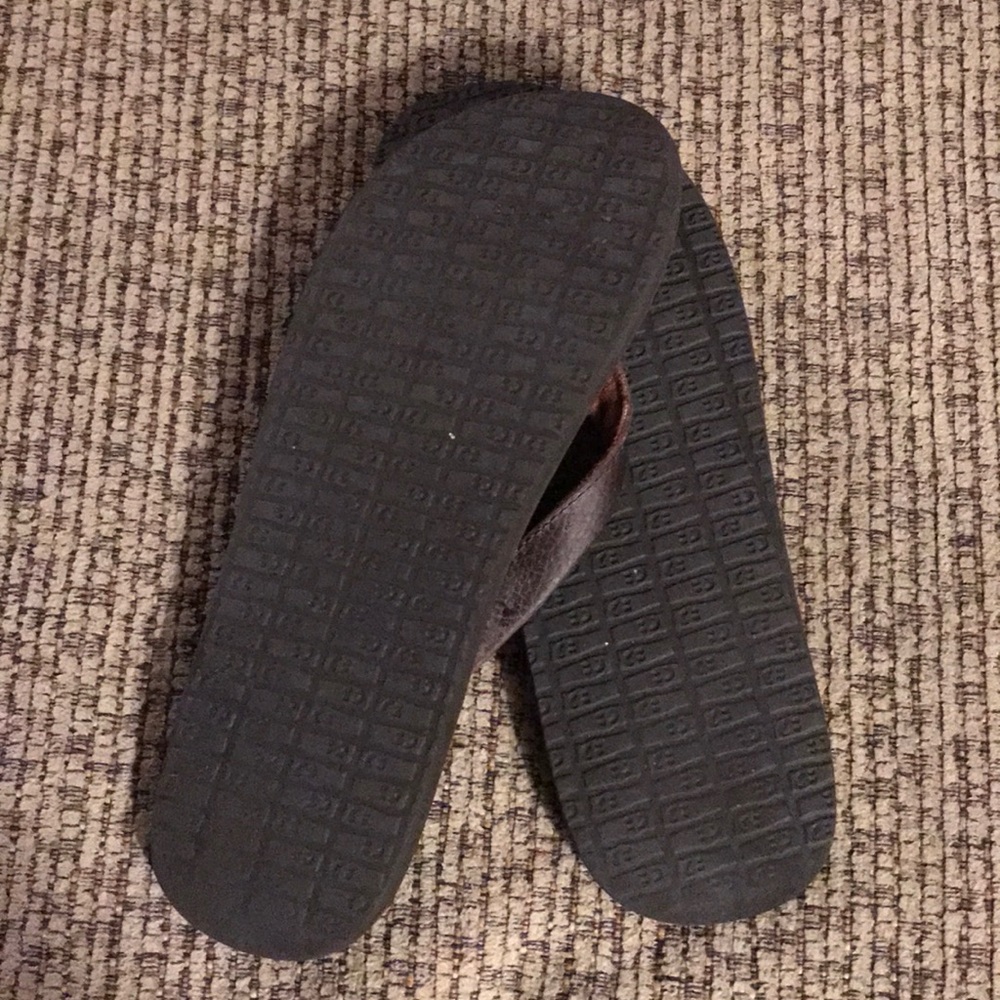 Brown flip flops